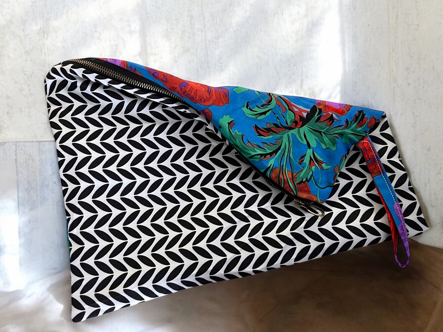 Geometric Elegance and Tropical Vibrance Dual-Sided Clutch